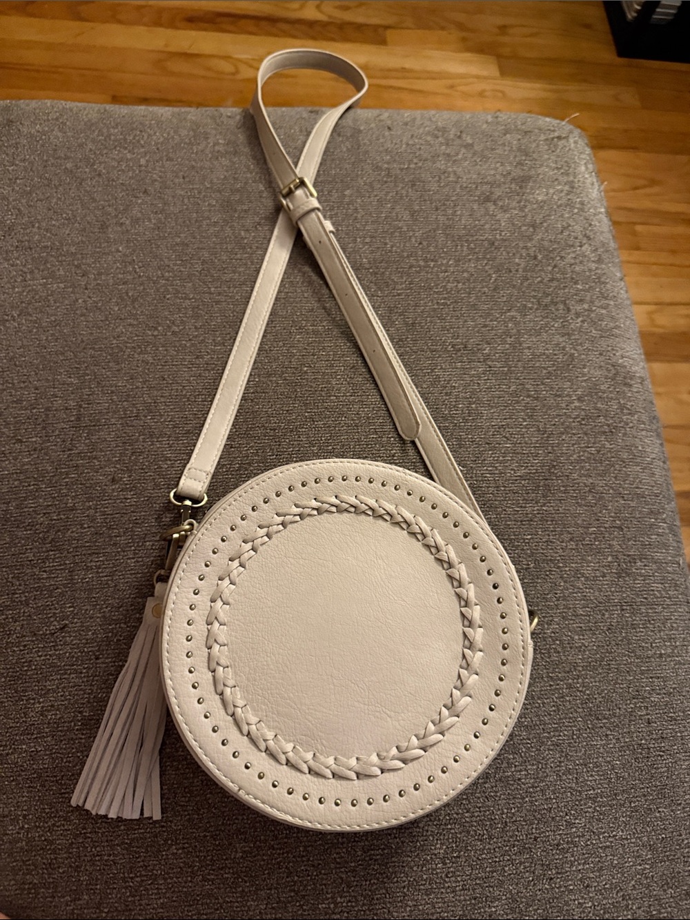 Moda Luxe Cream Round Crossbody Bag with Braided Stud Detail and Fringe Tassle